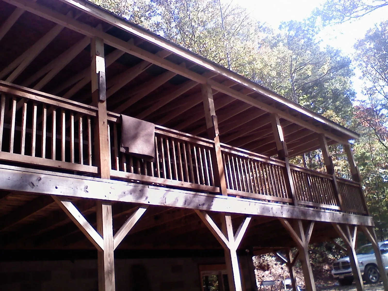 Timber framing under a new elevated porch and deck — Roof Leak Repair in Romeo by Roofing Brothers